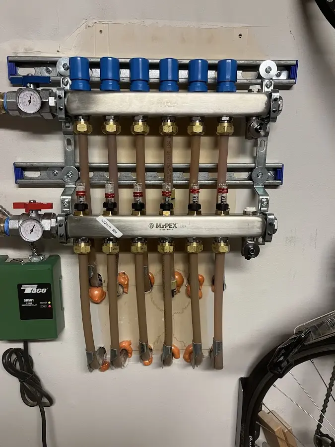 Plumber performing Leak Detection at a residential property in Grosse Pointe